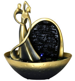 China Fontes de água decorativas do tampo da mesa da cor dourada na forma do dançarino fornecedor